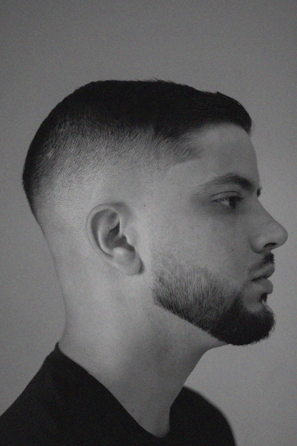 Skin fade with a shaped beard